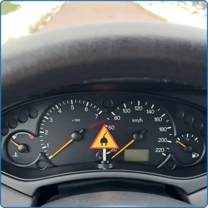 Reminder Sign Engine Heater below dashboard